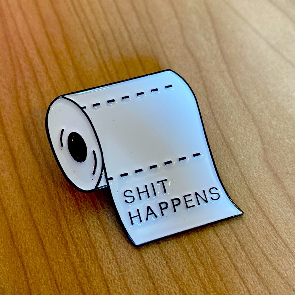 “Shit happens” toilet paper funny punny joke enamel pin